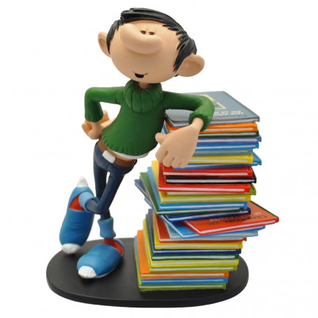 collectoys - Gaston Lagaffe relying on a stack of albums