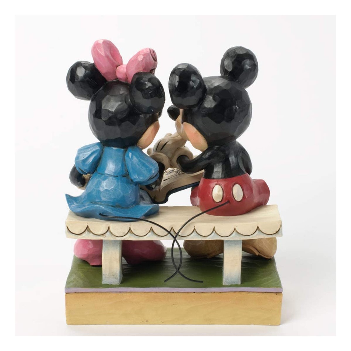 Enesco Disney Traditions - Mickey & Minnie leafing through a book