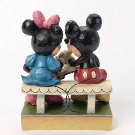 Enesco Disney Traditions - Mickey & Minnie leafing through a book