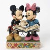 Enesco Disney Traditions - Mickey & Minnie leafing through a book