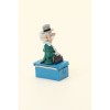 Pixi - Spirou - Champignac sitting on his canteen